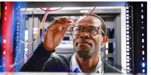 Telent engineer working on network infrastructure